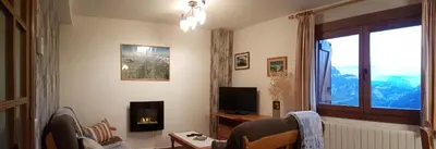 Una televisión o centro de entretenimiento en Casa Ortiz