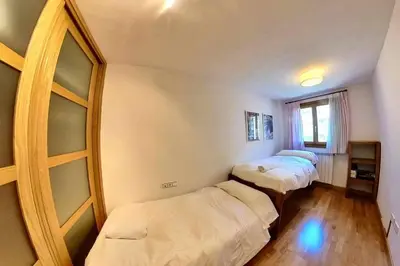 Cama o camas de una habitación en Casa El Paco - tucasaenlospirineos