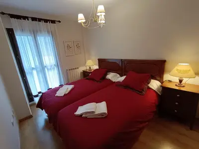 Cama o camas de una habitación en Inmocyma Cerler-Prados de Velarta C2 8 -vistas panorámicas