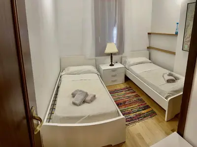 Cama o camas de una habitación en APARTAMENTO SAPPORO VIELHA