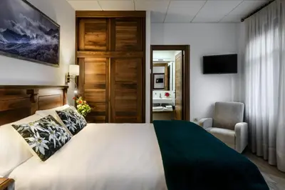 Cama o camas de una habitación en Hostal Bosque de Gamueta