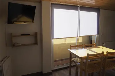 Una televisión o centro de entretenimiento en Apartamento Partara