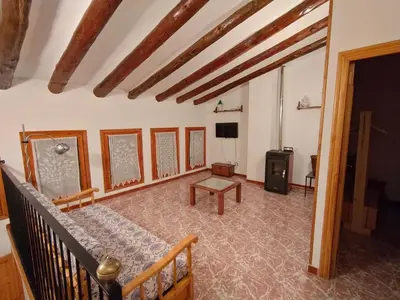 Una televisión o centro de entretenimiento en Casa el Ferrer