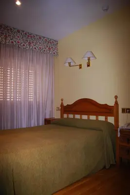 Cama o camas de una habitación en Hotel A Nieu
