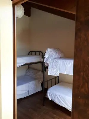 Cama o camas de una habitación en Albergue A'Noguera