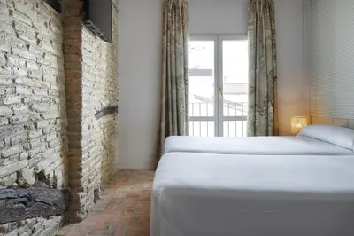 Cama o camas de una habitación en Pamplonapartments Pozo Blanco
