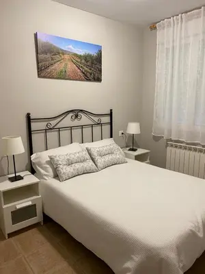Cama o camas de una habitación en Casa MARIA VILLARROYA