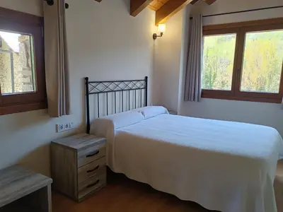 Cama o camas de una habitación en Rural Berrós