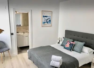 Cama o camas de una habitación en Apartamento Vive Zaragoza II