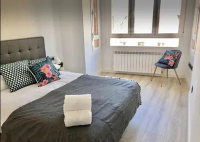 Cama o camas de una habitación en Apartamento Vive Zaragoza II
