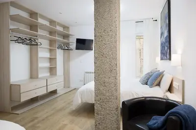 Una televisión o centro de entretenimiento en CARPE DIEM - Disfruta a lo grande