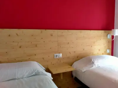 Cama o camas de una habitación en Hostal Meson de Paco