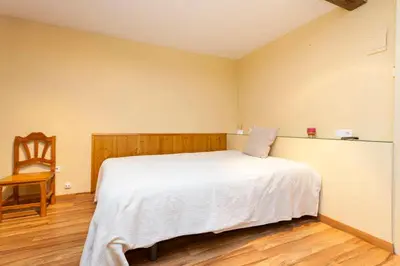 Cama o camas de una habitación en Casa Marieta Escarrilla