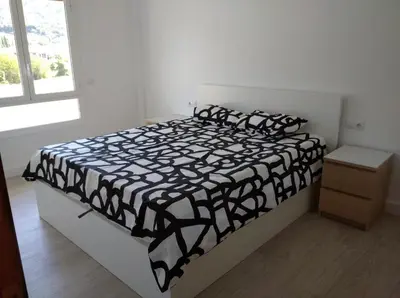Cama o camas de una habitación en Apartamento boltaña