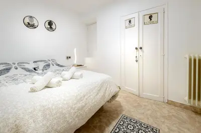 Cama o camas de una habitación en Casa Campanilla Jaca