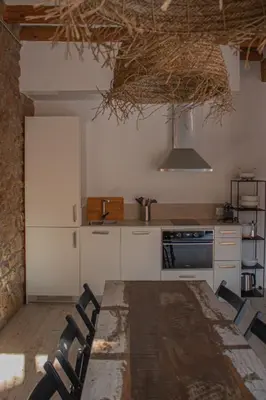 Una cocina o zona de cocina en La Casa Del Miracle