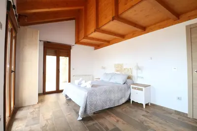 Cama o camas de una habitación en Casas Rurales Bestue-Ordesa