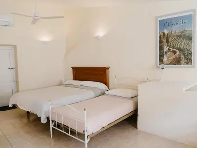 Cama o camas de una habitación en La Maysou
