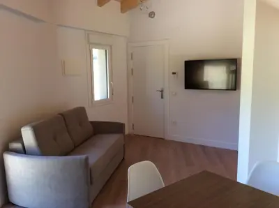Una televisión o centro de entretenimiento en Huertas de Muro Turismo Rural