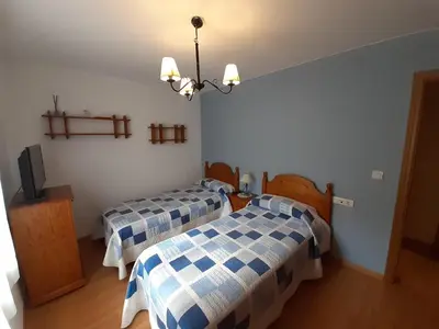 Cama o camas de una habitación en BIESCAS LAS PLACETAS