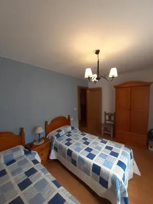 Cama o camas de una habitación en BIESCAS LAS PLACETAS