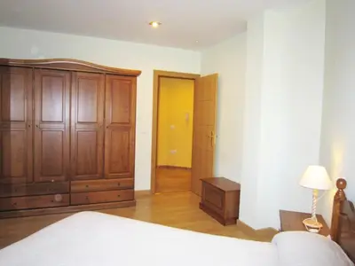 Cama o camas de una habitación en Apartamentos La Catedral