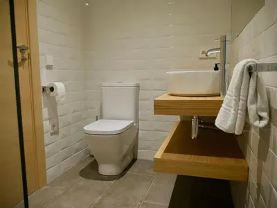 Un baño de El Corral de Baró