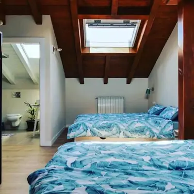 Cama o camas de una habitación en Acogedora casa rural en el centro de Navarra