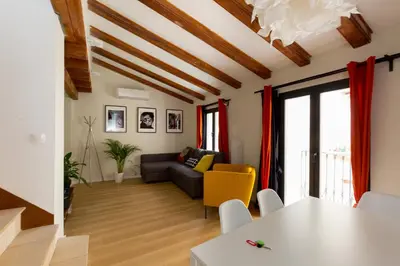 Zona de estar de CA3 - Duplex de dos dormitorios en el Centro Histórico con garaje