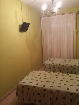 Cama o camas de una habitación en Hostal Vaticano