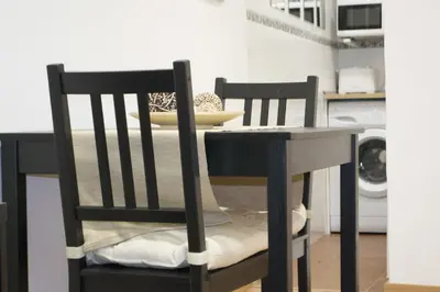 Cama o camas de una habitación en Apartamenticos Boggiero IV