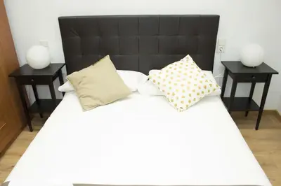 Cama o camas de una habitación en Apartamenticos Boggiero IV