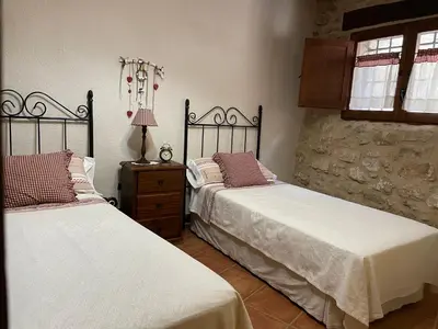 Cama o camas de una habitación en Casa Lidia - Antigua Posada Real