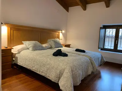 Cama o camas de una habitación en Atico Jaca Centro