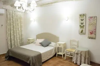 Cama o camas de una habitación en Apartamenticos Plaza Las Armas II
