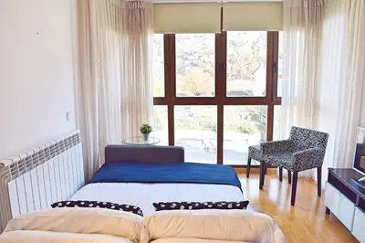 Cama o camas de una habitación en Escarra - Reformado, acogedor y luminoso, con garaje cubierto y ascensor BY PIRINEOS 360