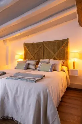 Cama o camas de una habitación en Ca la Casilda