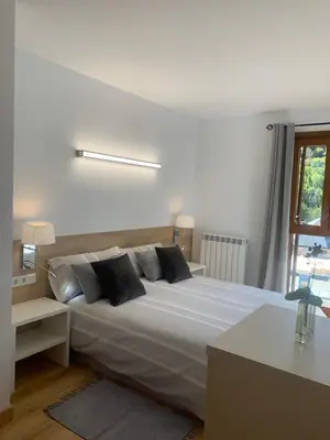 Cama o camas de una habitación en Santa María de Panticosa