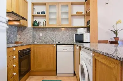 Una cocina o zona de cocina en Vielha centro calbeto VAD apartamento