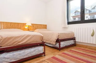 Cama o camas de una habitación en Vielha centro calbeto VAD apartamento