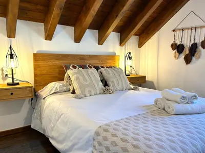 Cama o camas de una habitación en Apartament encantador, familiar i lluminós by RURAL D'ÀNEU