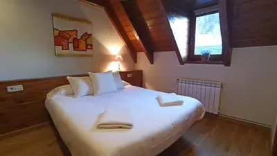 Cama o camas de una habitación en Tredós, Casa adosada. Baqueira