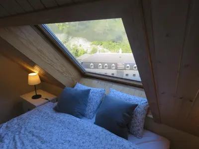 Cama o camas de una habitación en Ático Dúplex reformado con vistas a la montaña