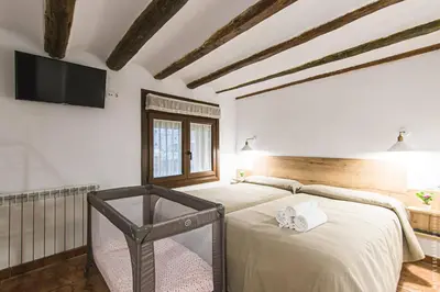 Cama o camas de una habitación en Paisajes del Ebro Alojamiento