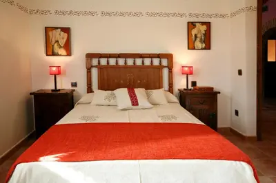 Cama o camas de una habitación en Casa Rural Los Pedregales