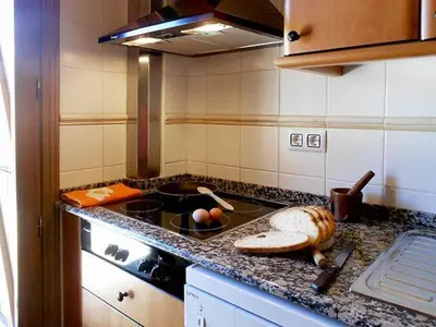 Una cocina o zona de cocina en Apartamentos Turismo Rural Casa Santorroman