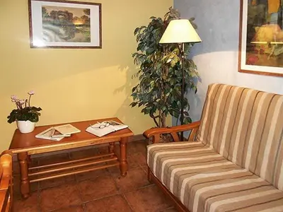 Zona de estar de Apartamentos Turismo Rural Casa Santorroman