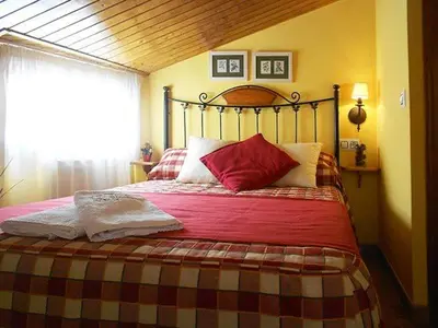 Cama o camas de una habitación en Apartamentos Turismo Rural Casa Santorroman