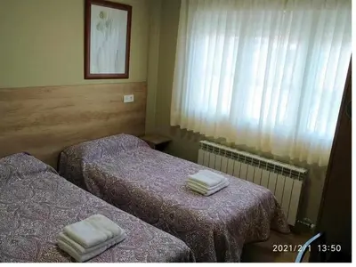 Cama o camas de una habitación en Hotel-Pension BORJA