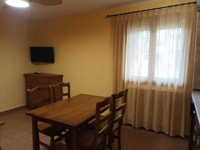 Una televisión o centro de entretenimiento en Casa Diego Apartamentos Turisticos
